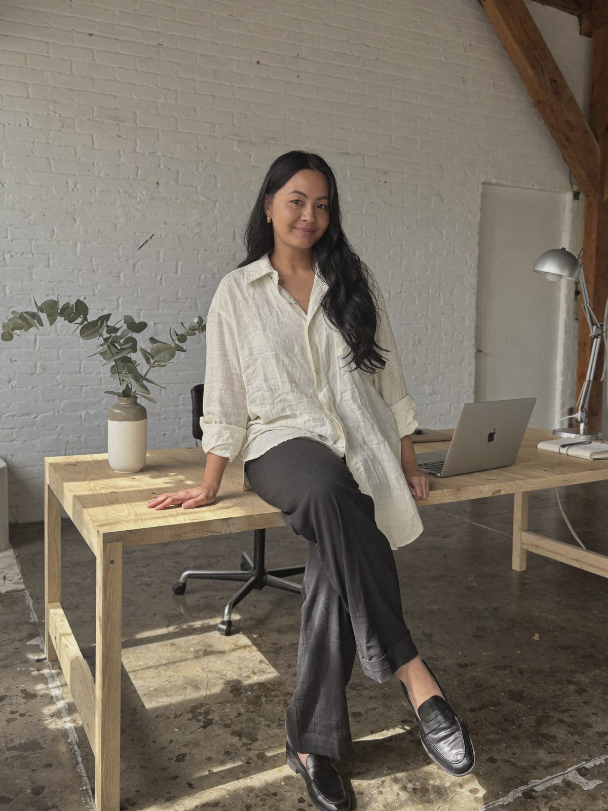 Jenn Yang, director of DotVA, at her workspace